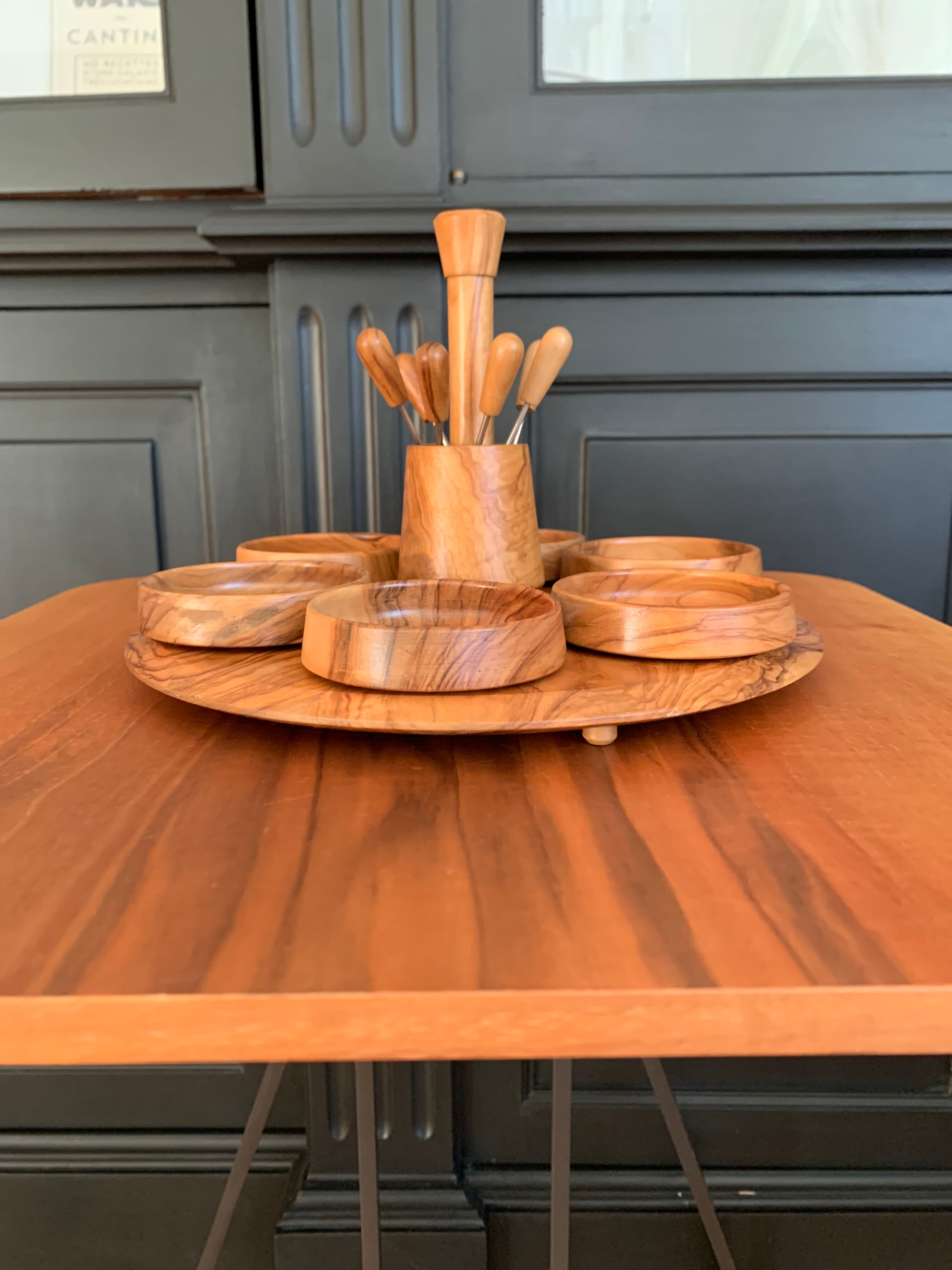 Servant aperitif in olive tree