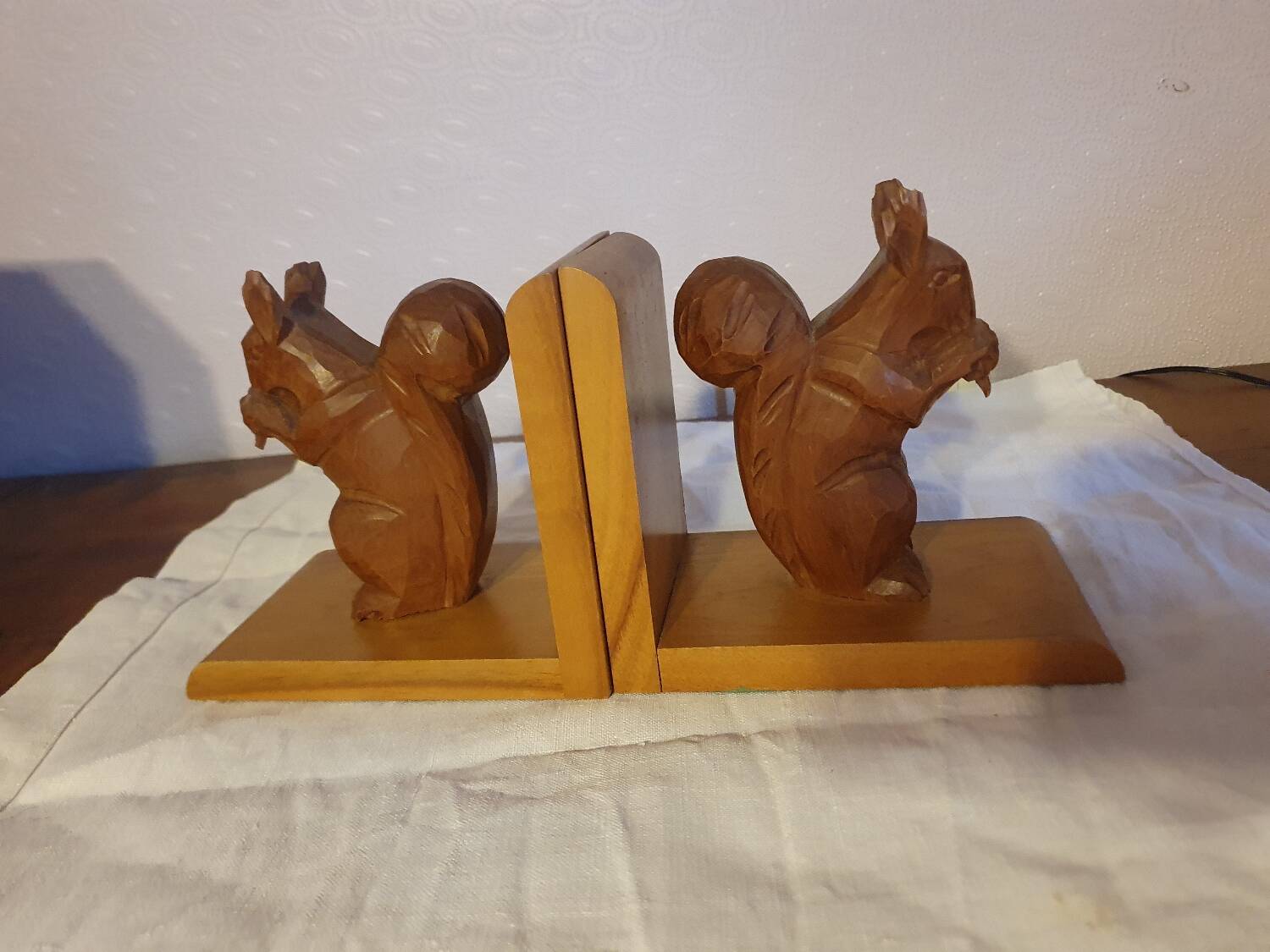 Vintage hand-carved wooden squirrel bookend