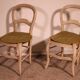 2 chaises paillées en bois polychrome