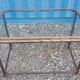 Table with an old ship porthole in brass and a metal base / 110 x 70 x 76 cm