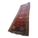 Large antique Oriental hallway carpet made of hand-knotted wool.