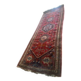Large antique Oriental hallway carpet made of hand-knotted wool.