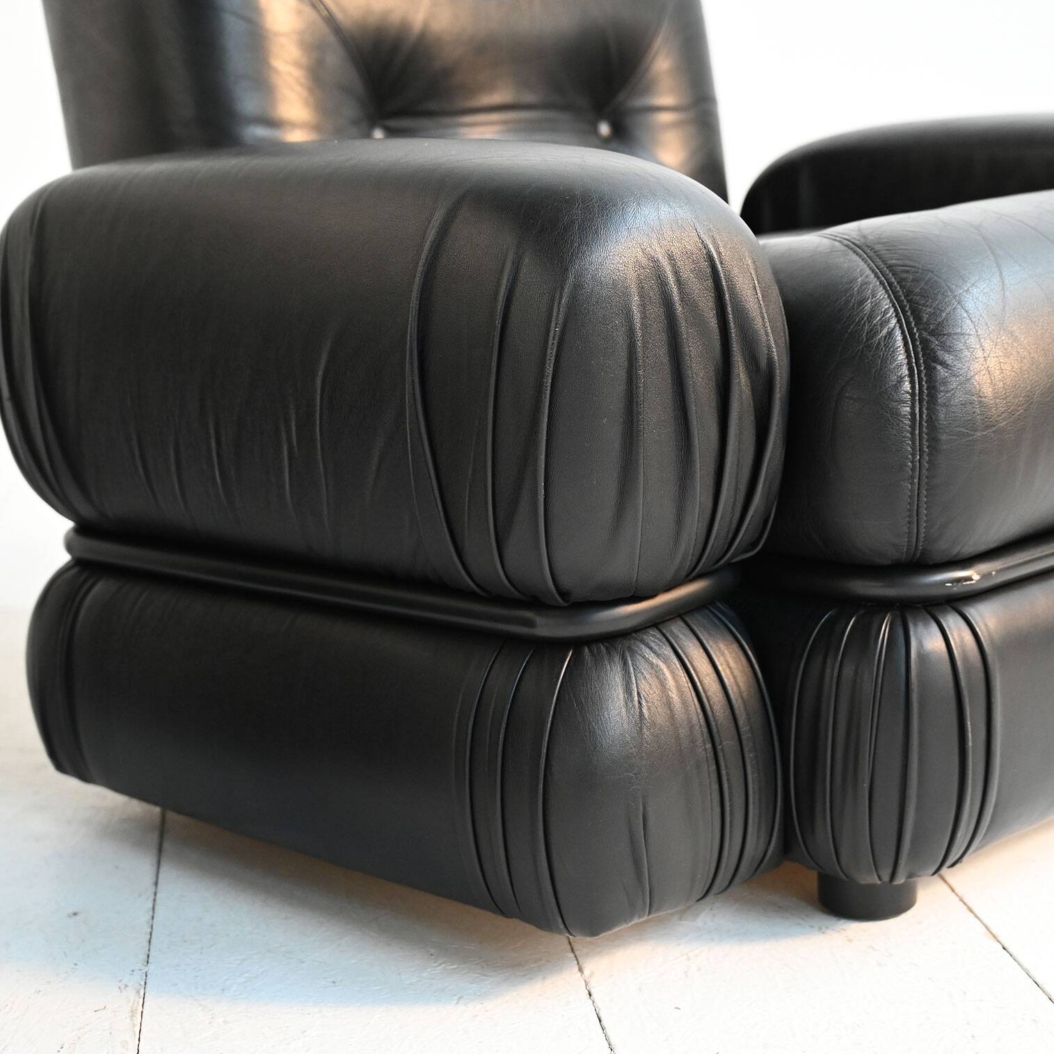 Black leather and tubular steel armchairs, 1970s