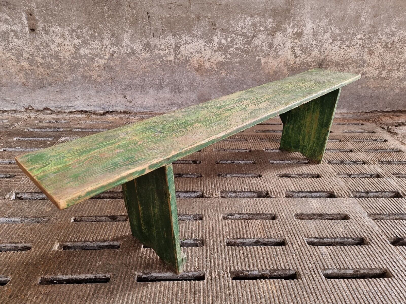 Old wooden bench side table grass green