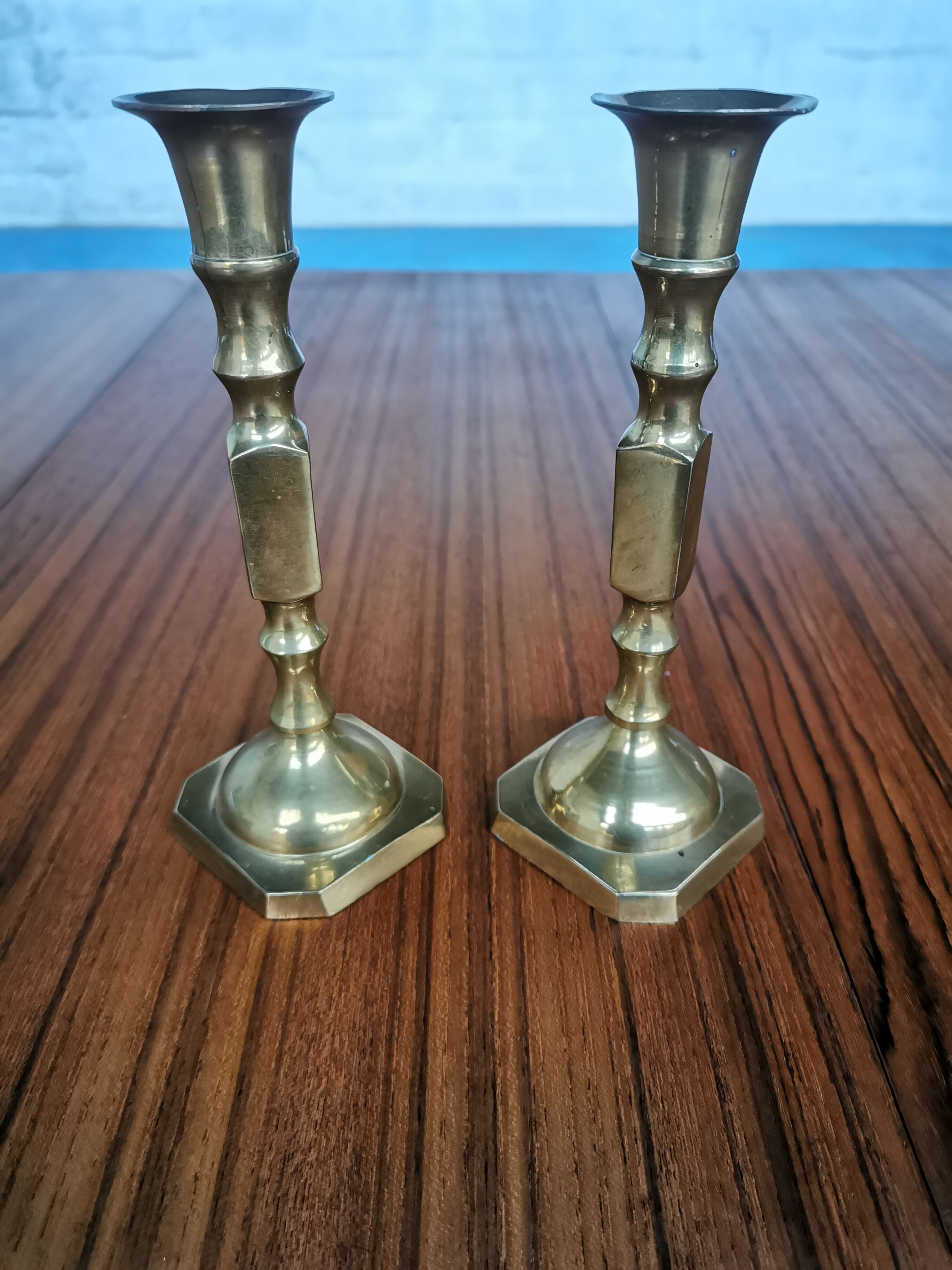 Duo of brass candle holders