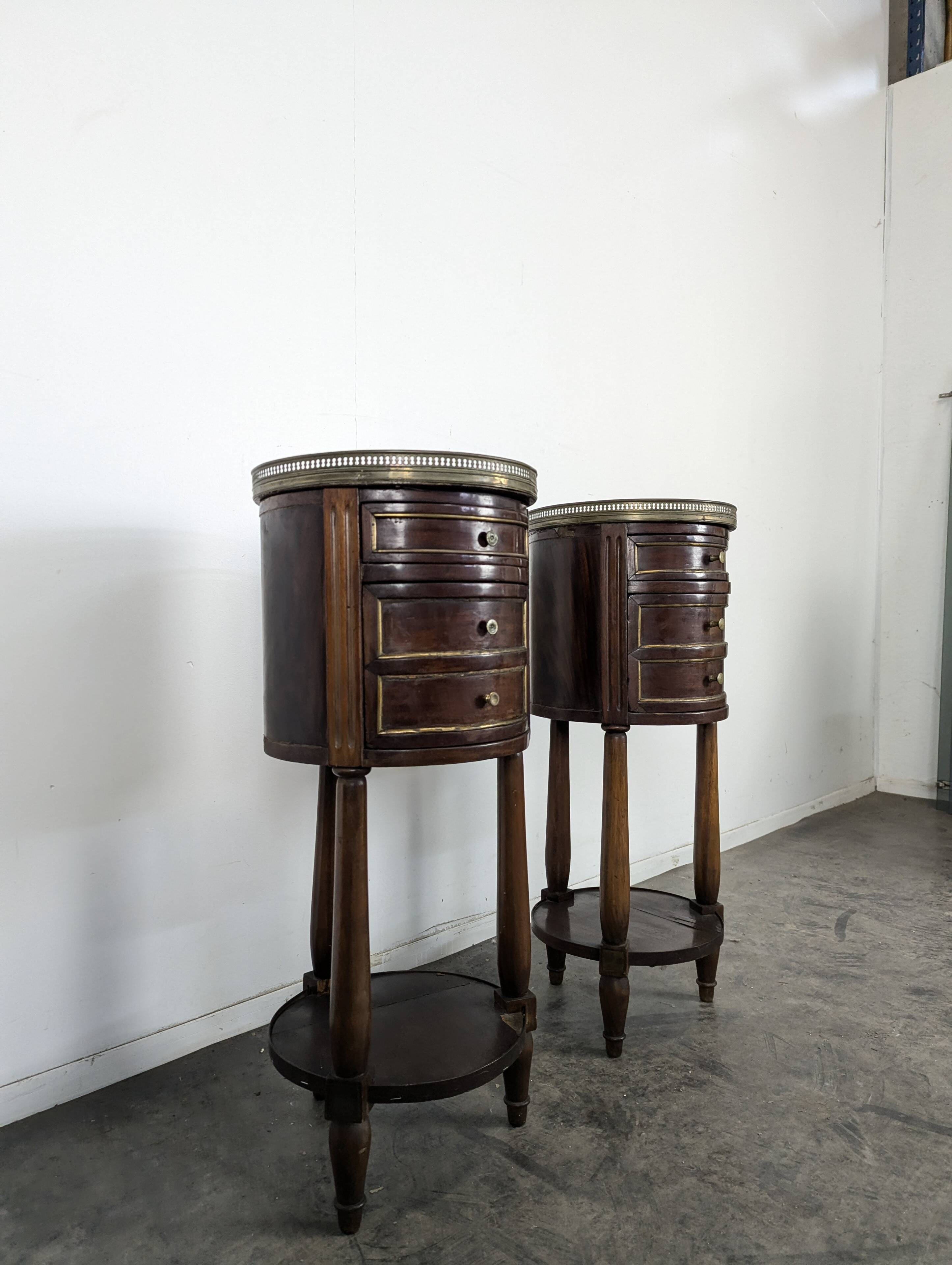 Pair of Louis XVI style bedside tables with a gallery.