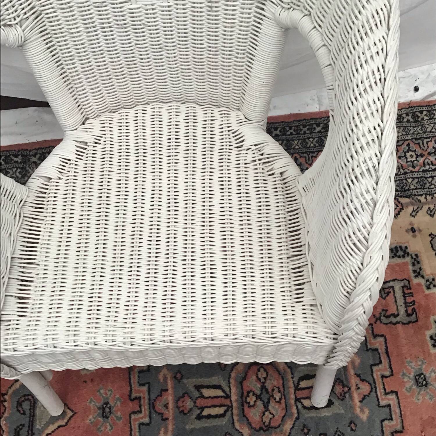 White rattan armchair with pretty vintage
