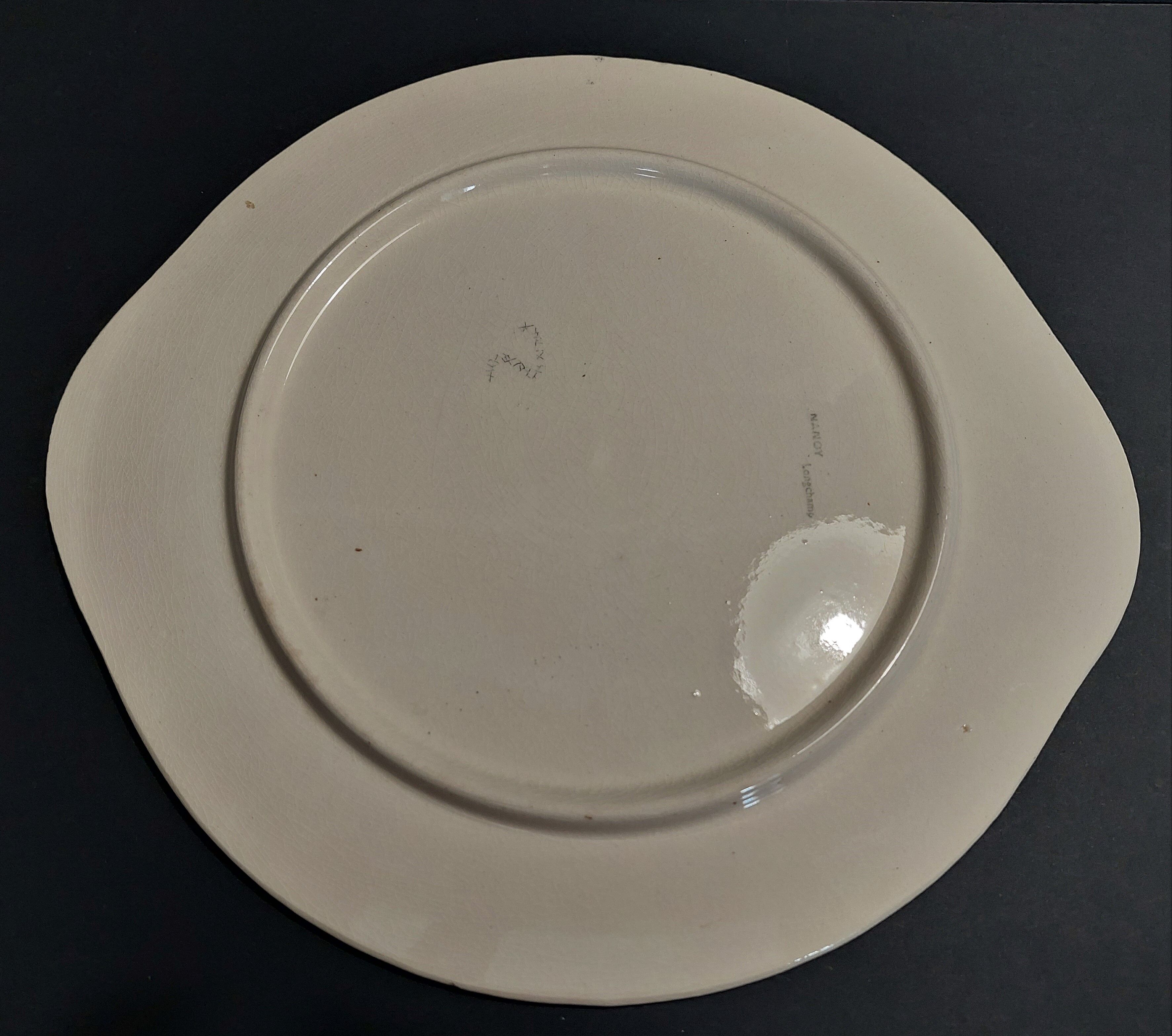 Plat de service rond faïence Longchamp décor Nancy début XXème