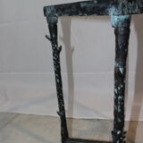 Giacometti style cast iron table, glass table