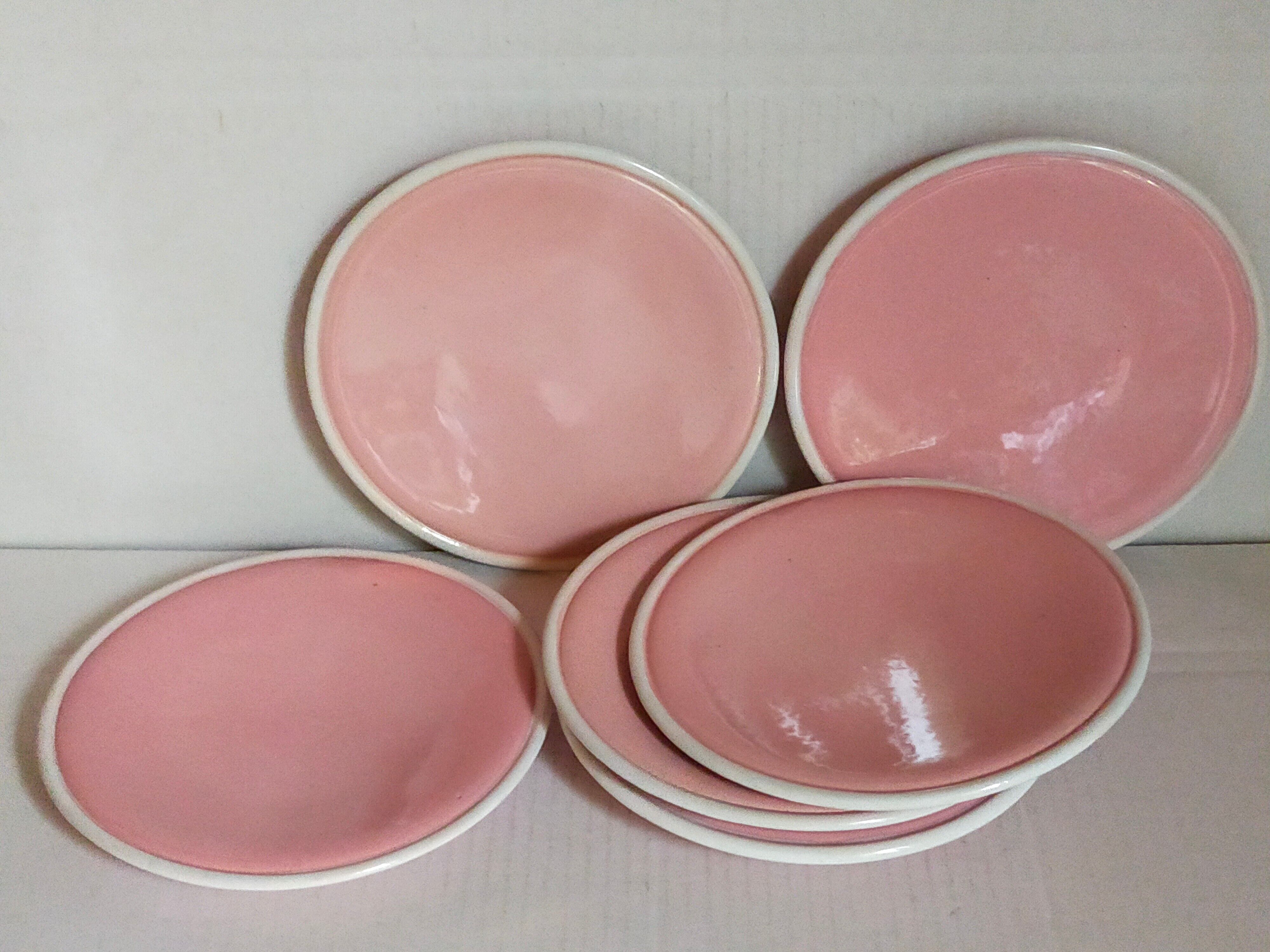 Six old pink earthenware dessert plates