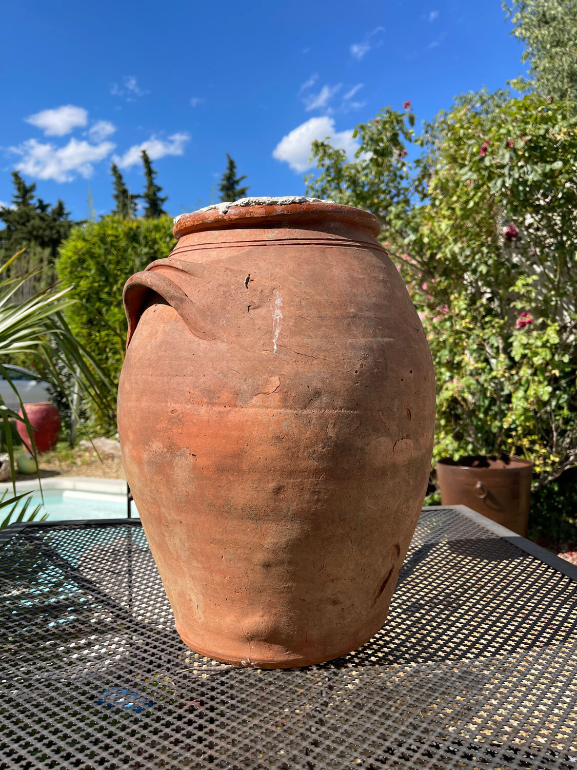 Ancient terracotta pottery jar
