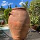 Ancient terracotta pottery jar