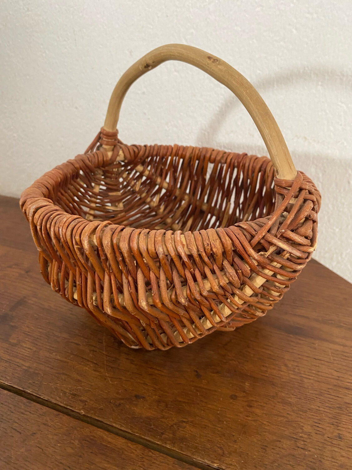 Small handmade basket made of hazel wood.