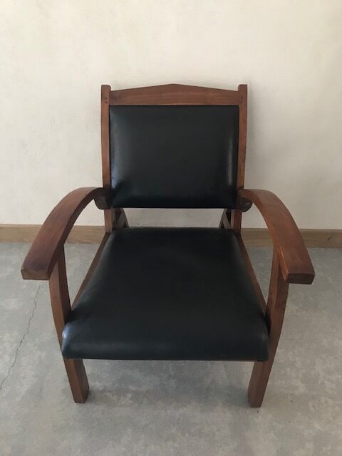 Teak armchair and black leather