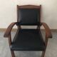 Teak armchair and black leather