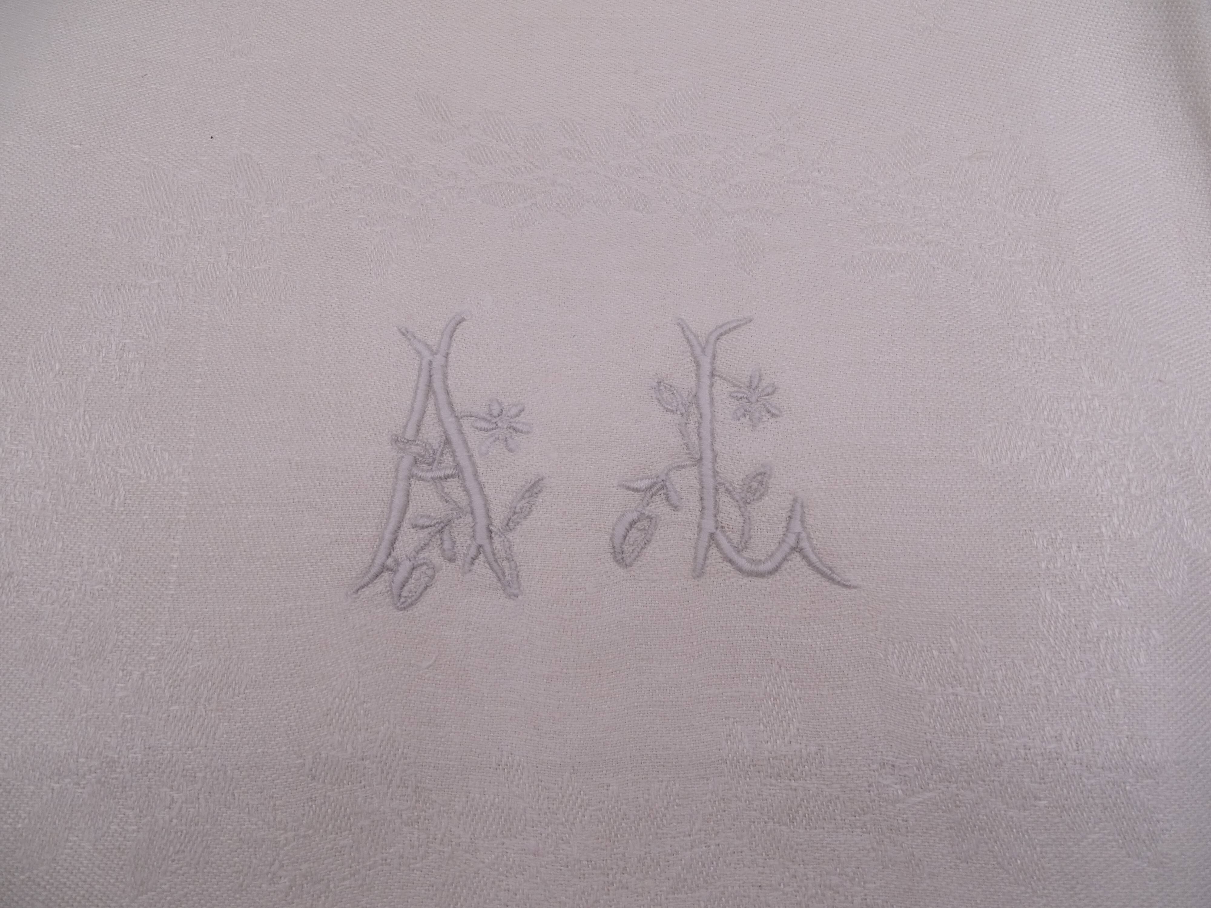 12 monogrammed cotton pad towels AL - Circa 1900