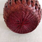 Japanese vase made of woven bamboo. Ikebana.