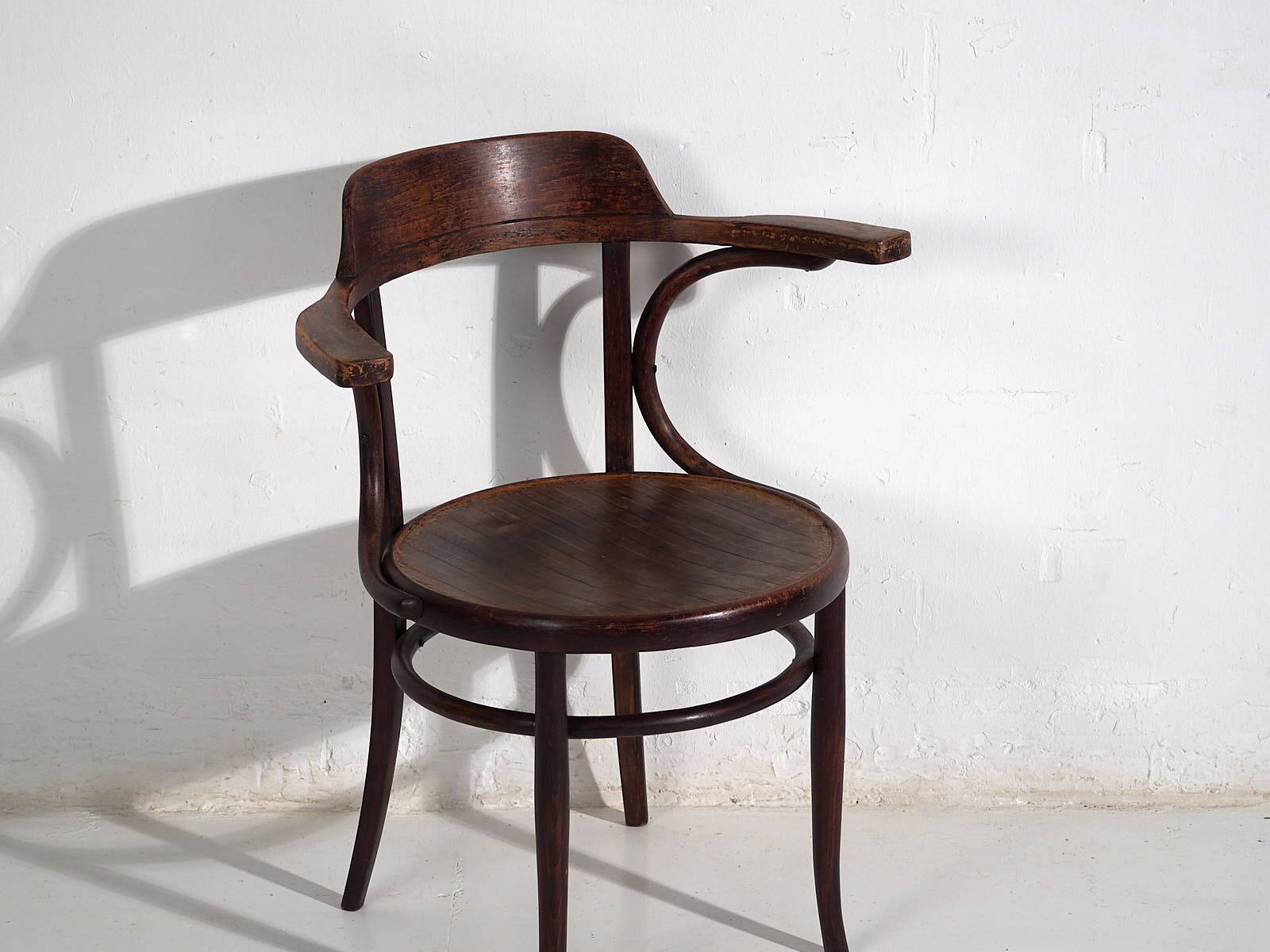 Antique chair with armrests (c.1920)