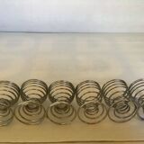 Six spiral spring egg cups