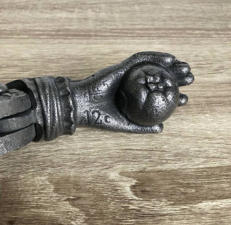 Vintage hand door knocker