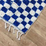 Moroccan Berber rug with a blue and ecru checkerboard pattern – 250 x 147 cm
