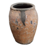 Old orange terracotta pot