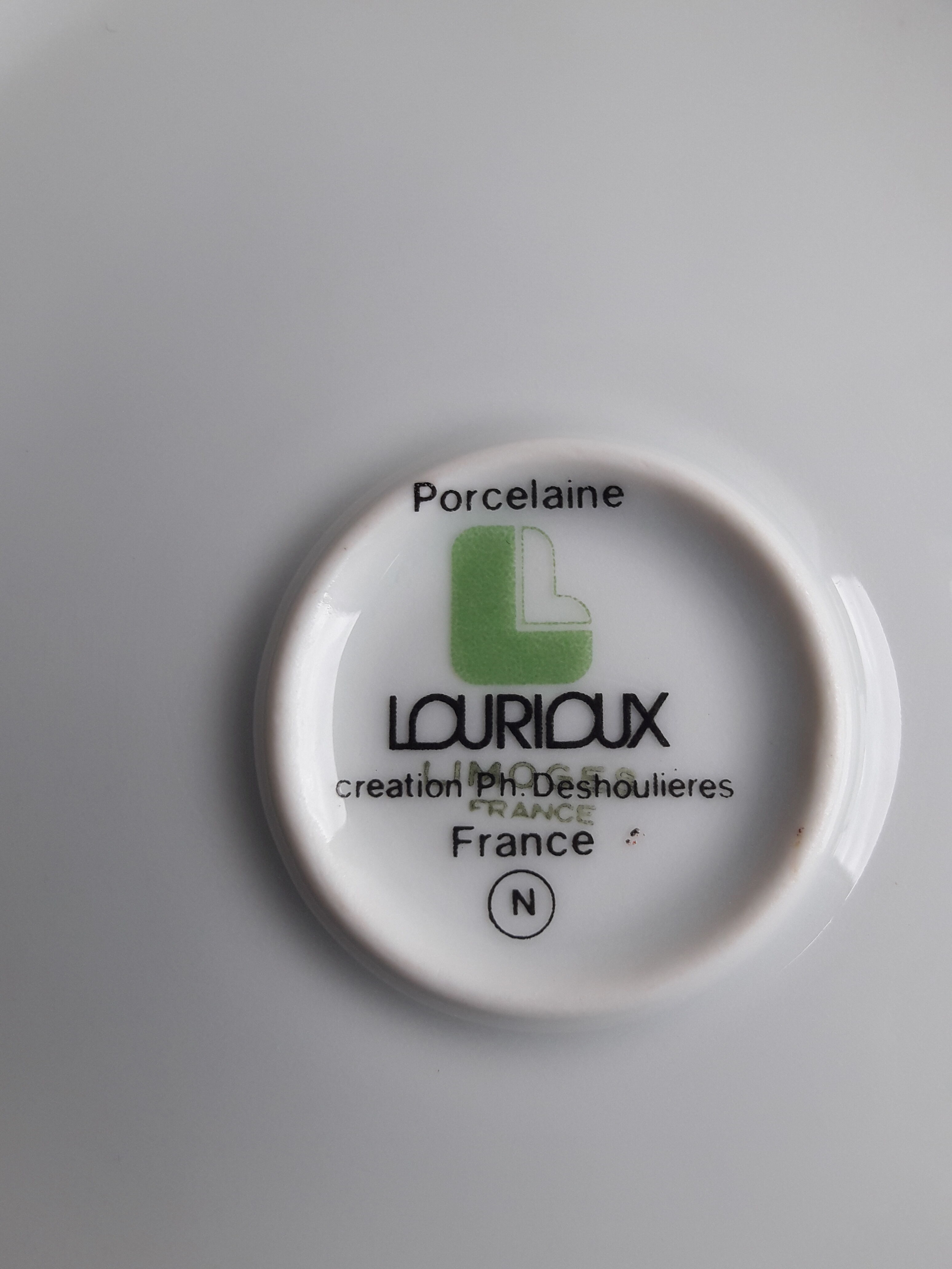 Lourioux porcelain raclette service created by Philippe Deshoulières