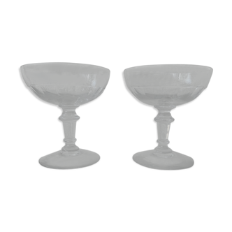 2 old champagne glasses with glass cut-outs