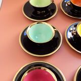 set of 9 black and gold Salins cups and saucers