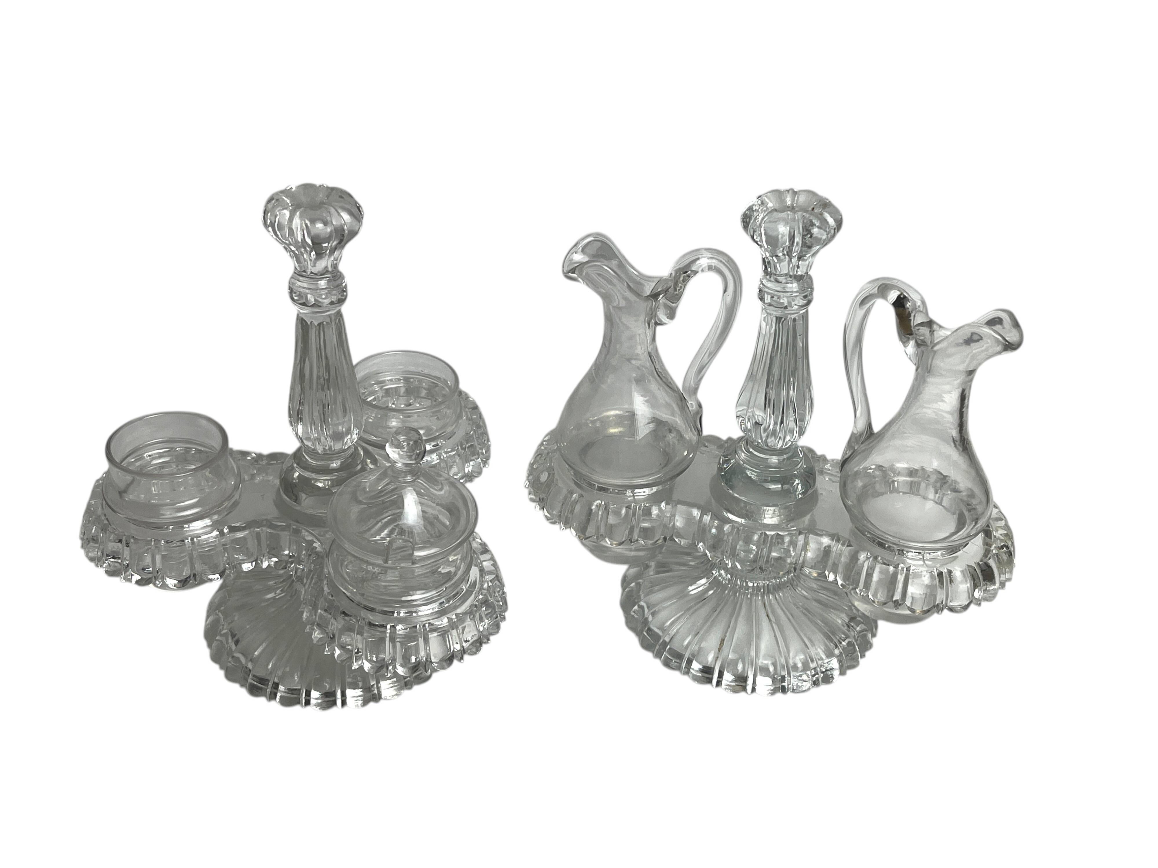 Tableware, two moulded glass table servants from the early 20th century.