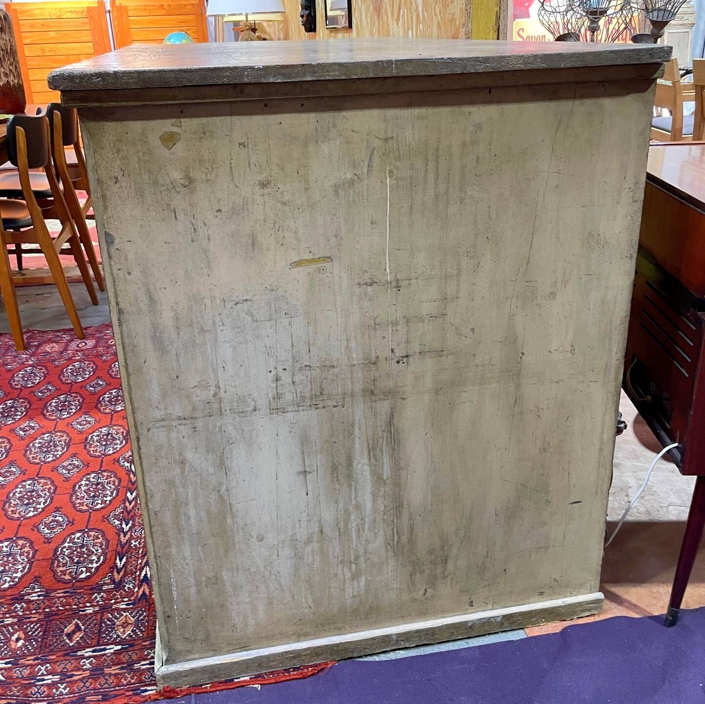 Old workshop furniture in good condition. 8 drawers and 2 drop-down doors, very