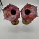 Pair of wall sconces in the shape of bells