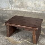 Small auxiliary stool in upcycled teak with traces of green chrome on the leg.