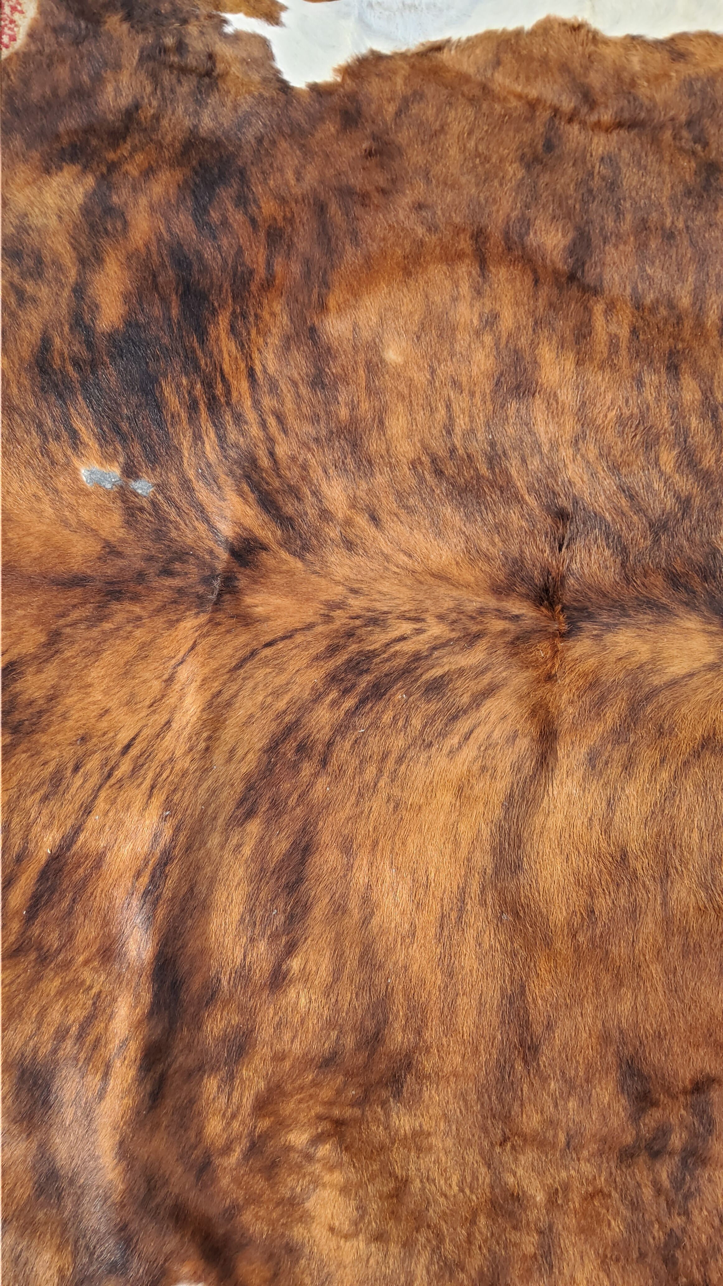 Tapis peau de vache des années 70