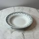 Set of 6 deep plates Saint Amand with floral garland decoration.