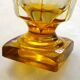 Art Deco vase engraved with flowers, faceted body on a pedestal.