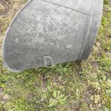 Antique children's bathtub in zinc