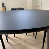 Roche Bobois Globe Trotter collection table and its four chairs