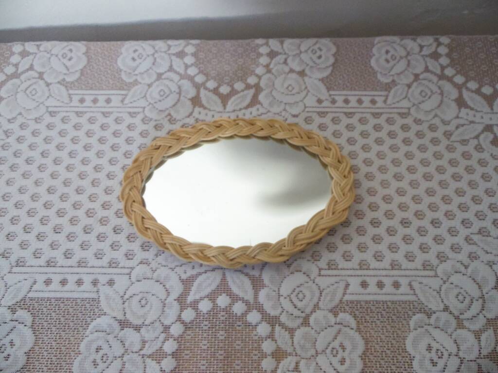 Small oval wicker mirror
