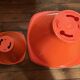 2 vintage orange Pola stools