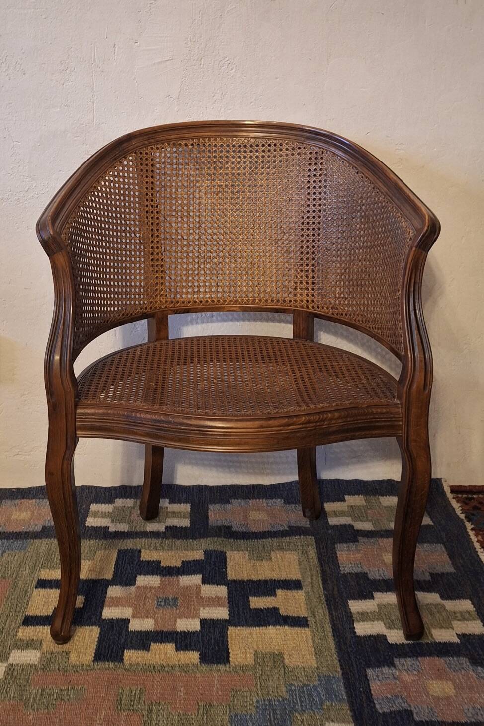 Half-moon rattan and hardwood armchair, early 20th century