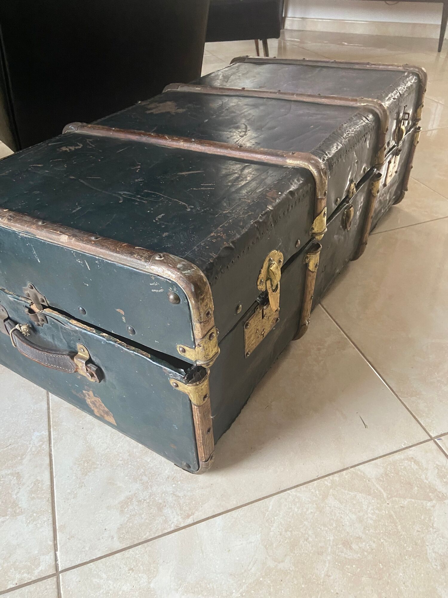 Old trunk in zinc/wood and brass