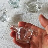 Set of four small transparent glass candle holders 3 spikes 1 heart