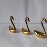 Brass swans