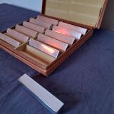 12 porte couteaux chromés