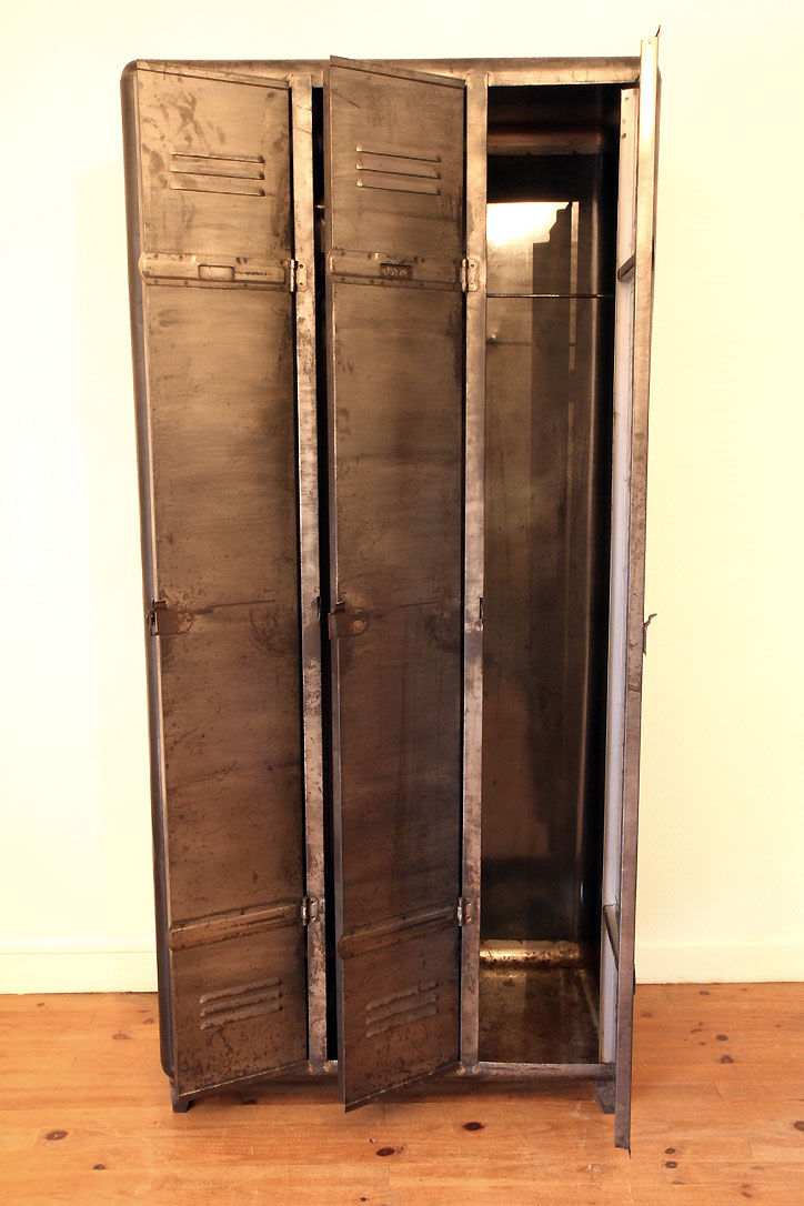 Industrial metal cloakroom with rounded corners.