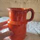 Pitcher vase in orange stoneware