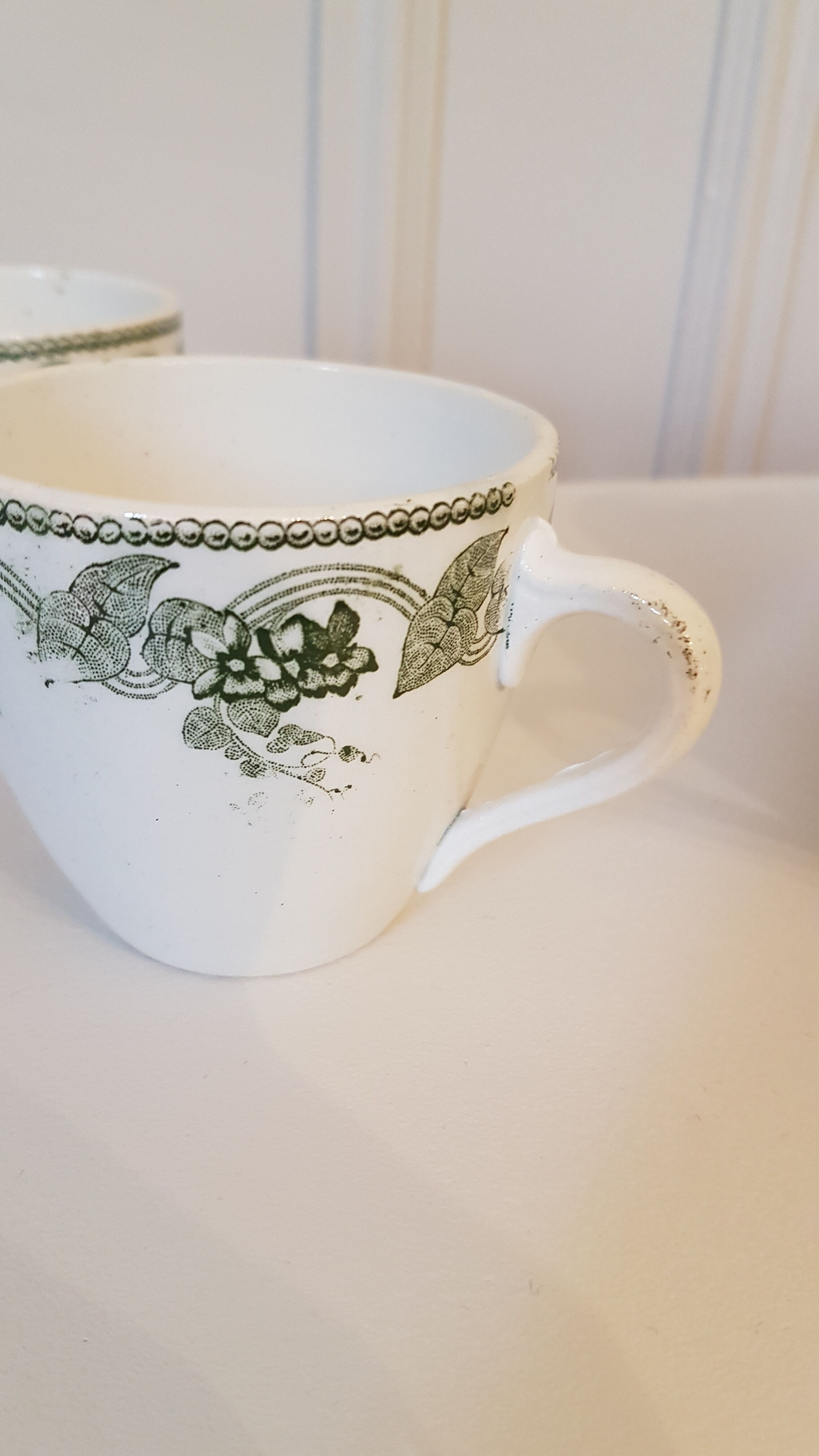 Set of 11 porcelain cups