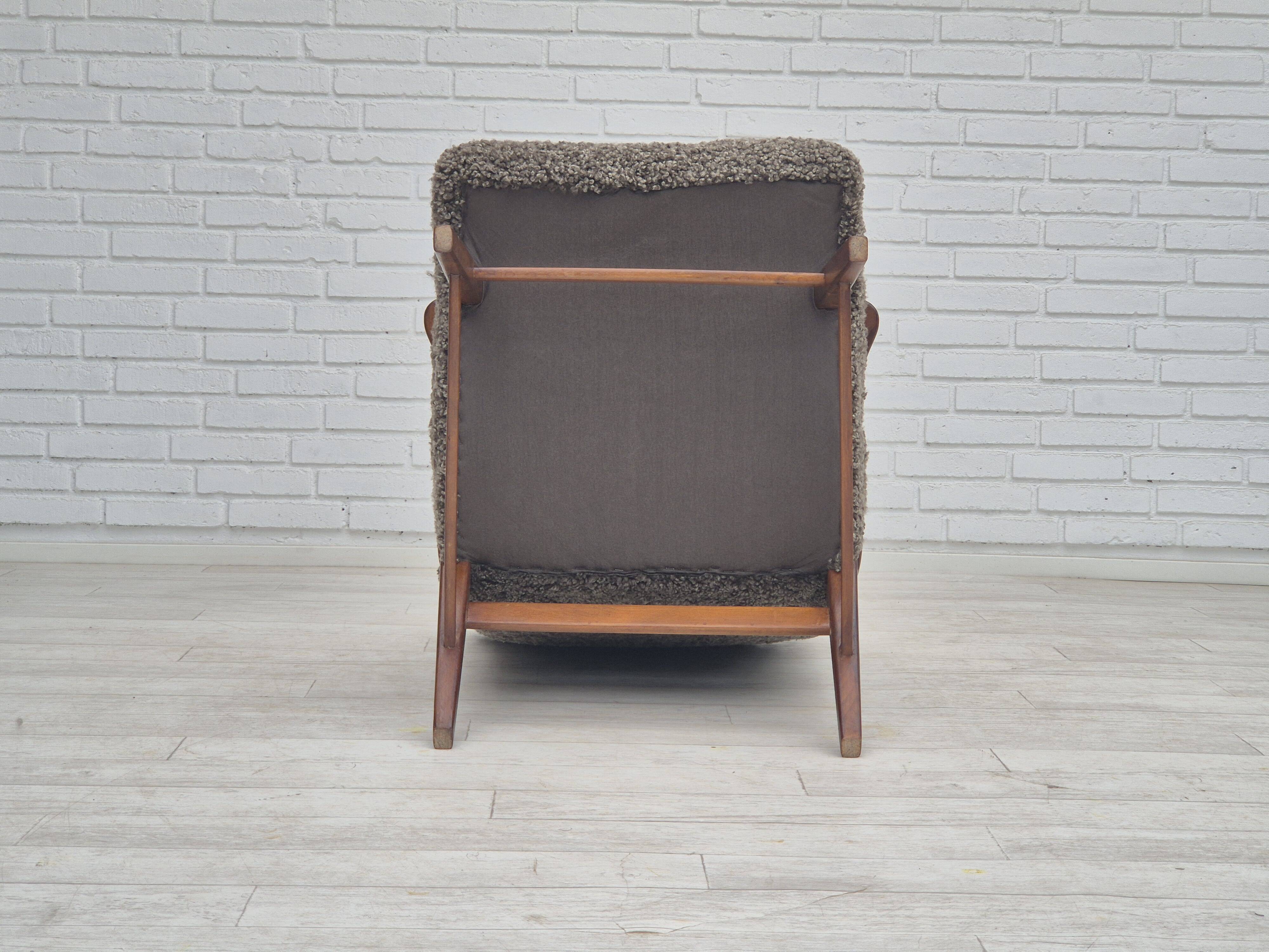 60s, Danish design, refurbished armchair, genuine sheepskin "Wellington".