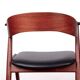 Danish armchair in teak and Skai, by Henning Kjaernulf for Korup Stolefabr.